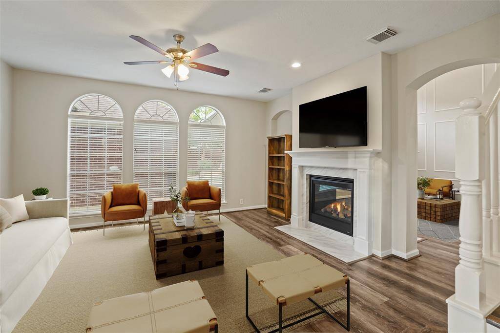 This is a virtually staged image. But a great idea of how to set up this room from the kitchen!