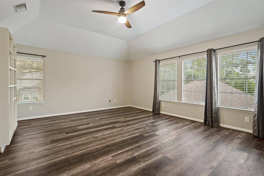 Another view of this amazing game room showing more windows and just how great of a size this room is!