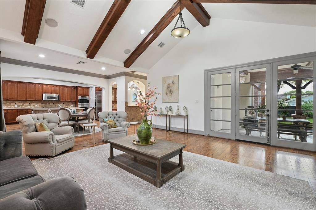 Welcome to the fantastic living space which overlooks the covered veranda, chefs kitchen and bonus room!