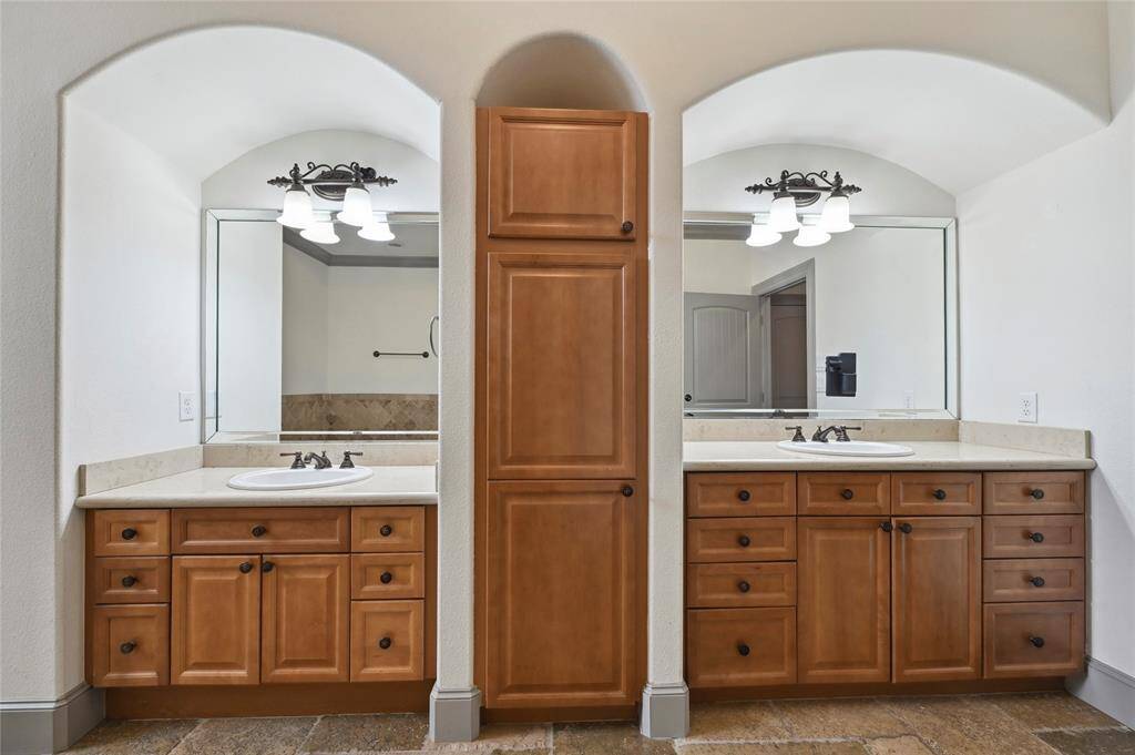 Separate vanity sinks in the primary bathroom!