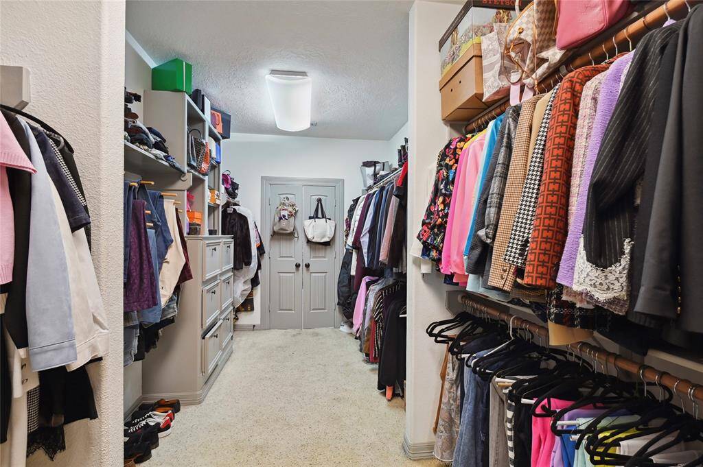 Welcome to your spacious walk-in closet!