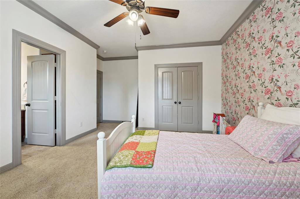 Darling bedroom has an attached full bathroom!
