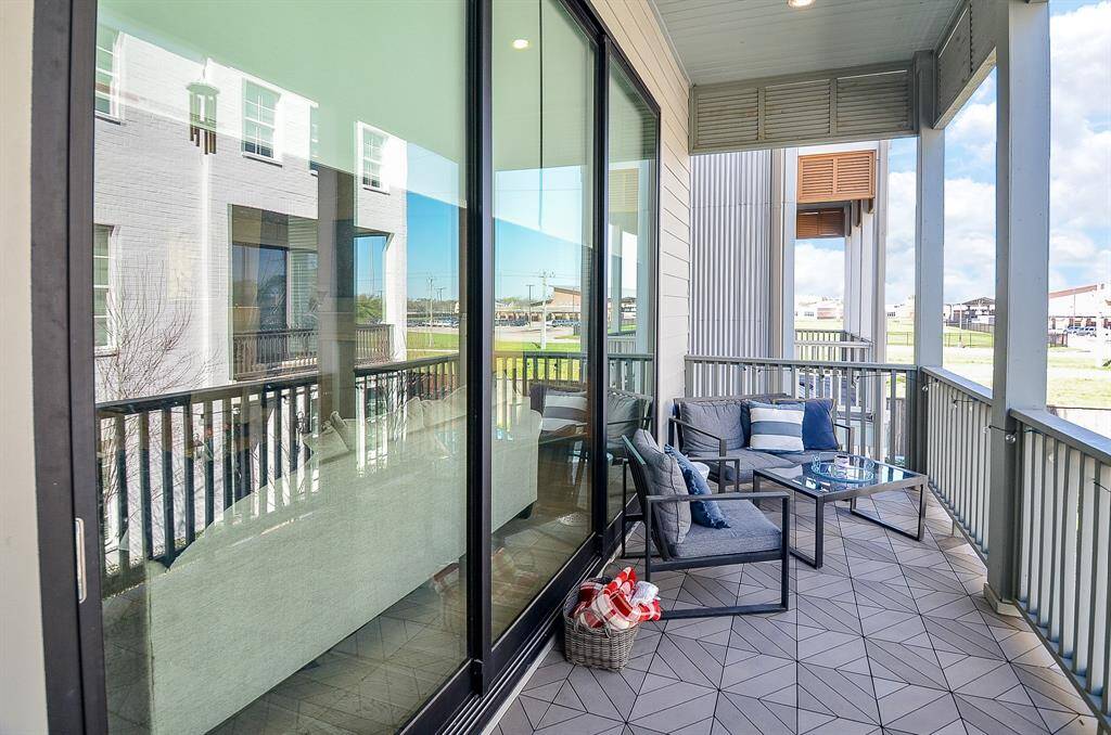 Desirable expansive view off the balcony with area for relaxing.