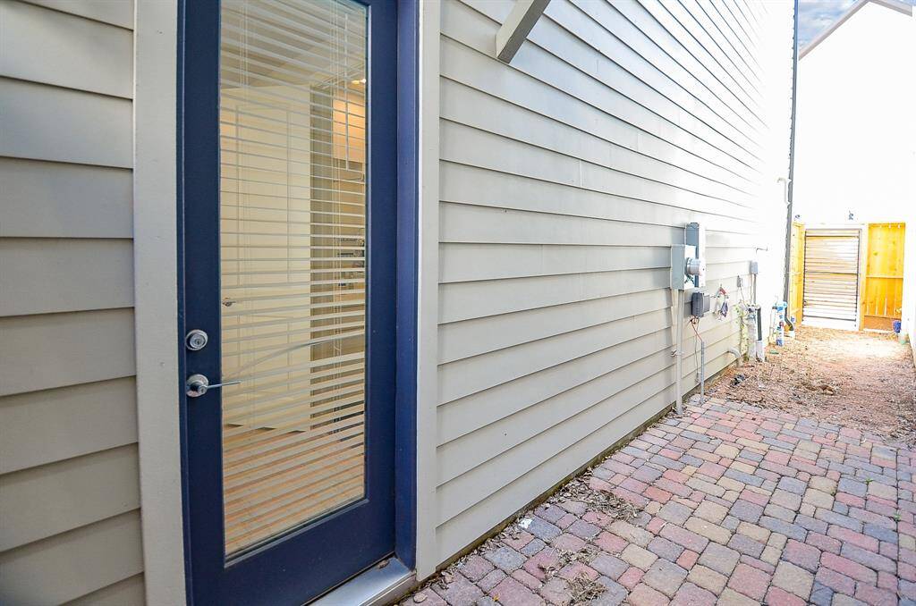Side door from 1st floor secondary bedroom.