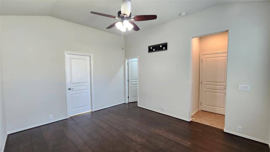 Master bathroom with walk-in master closet