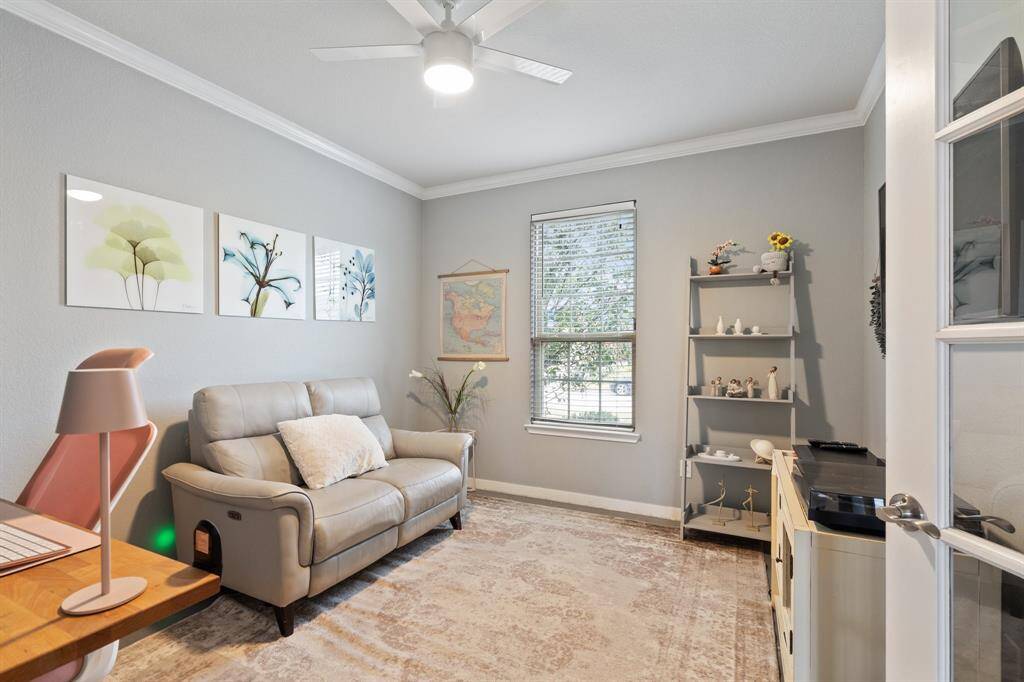 Transform your work routine into ahaven of productivity and comfort inthis thoughtfully designed homeoffice. Located behind private Frenchdoors, the room features crown molding and a window that allows innatural light.