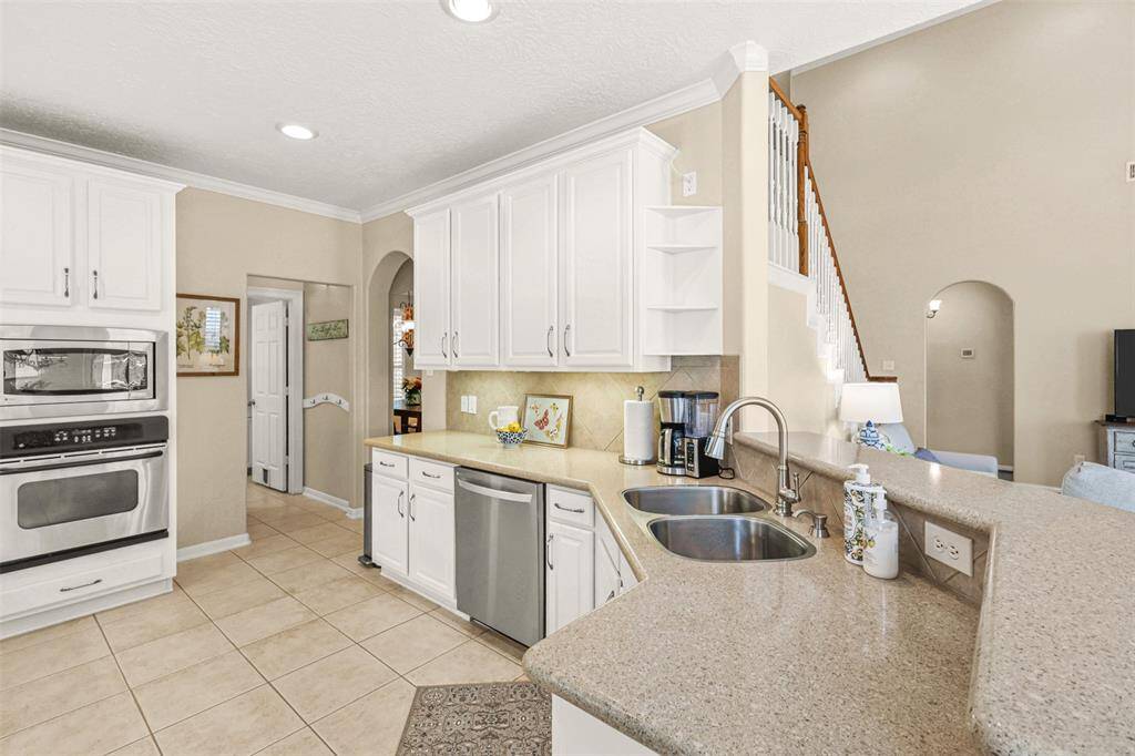 The large walk-in pantry is conveniently located to the left of the laundry room.  A new faucet was added in 2022.