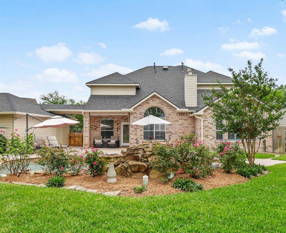 Nestled in an expansive cul-de-sac lot, this backyard oasis features a heated pool with a cascading waterfall, a relaxing jacuzzi, beautiful gardens and a newly resurfaced patio.