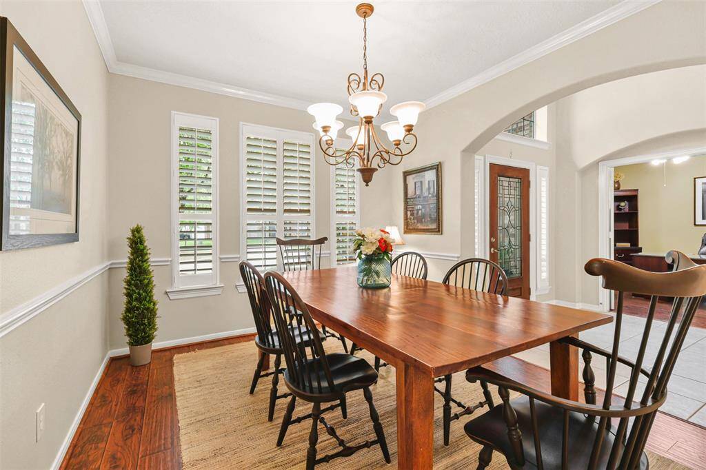 This spacious formal dining room welcomes friends and family.