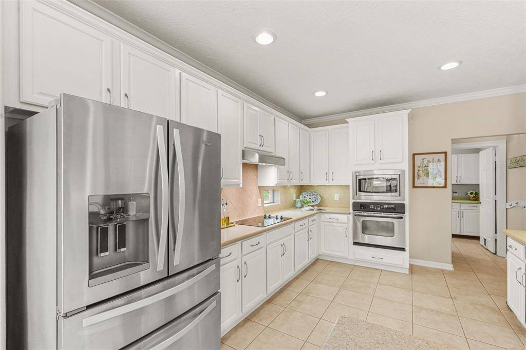 The refrigerator will convey with the home.