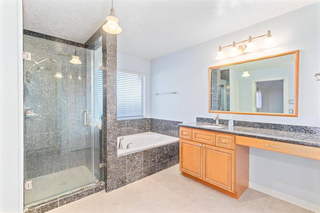 Walk-in shower with jetted tub