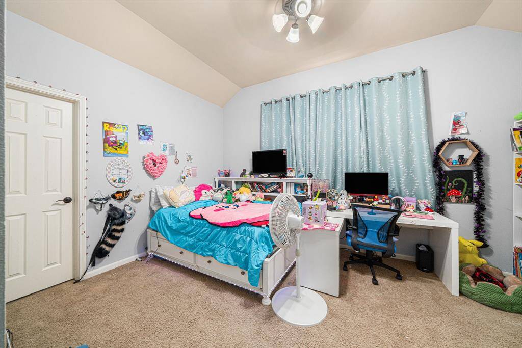 This spacious secondary bedroom offers a secluded retreat, thoughtfully positioned apart from other bedrooms for enhanced privacy. The room features generous windows filling the space with natural light, a sizable walk-in closet, and a dedicated ensuite bathroom - perfect for guests or family members seeking a private sanctuary.