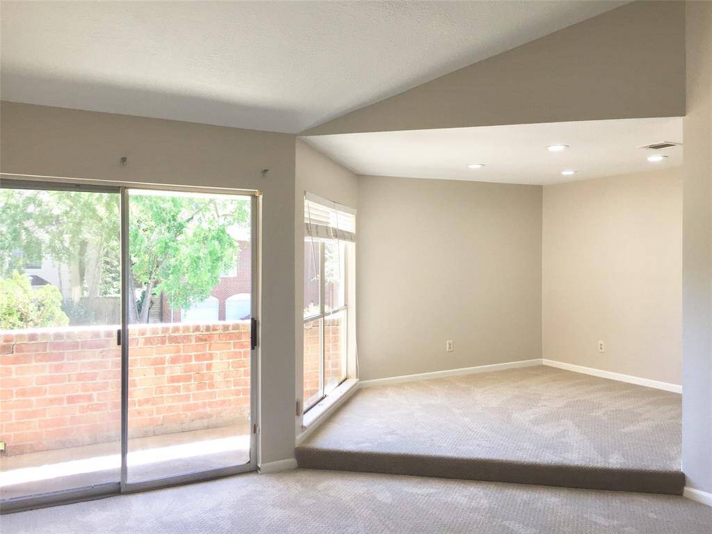 This PRIMARY BEDROOM SUITE is VERY LARGE.  It has this angled space for optional Bed Placement and opens to a PRIVATE PORCH / BALCONY.