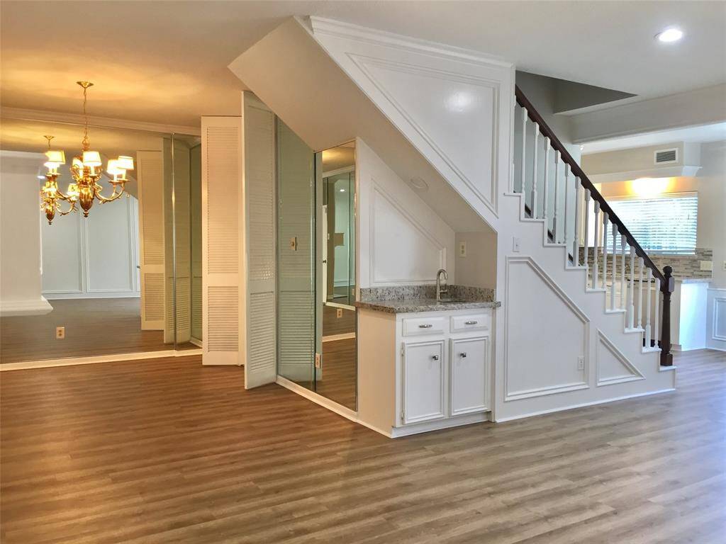 MAIN LIVING AREAS downstairs with fresh paint and new floors.