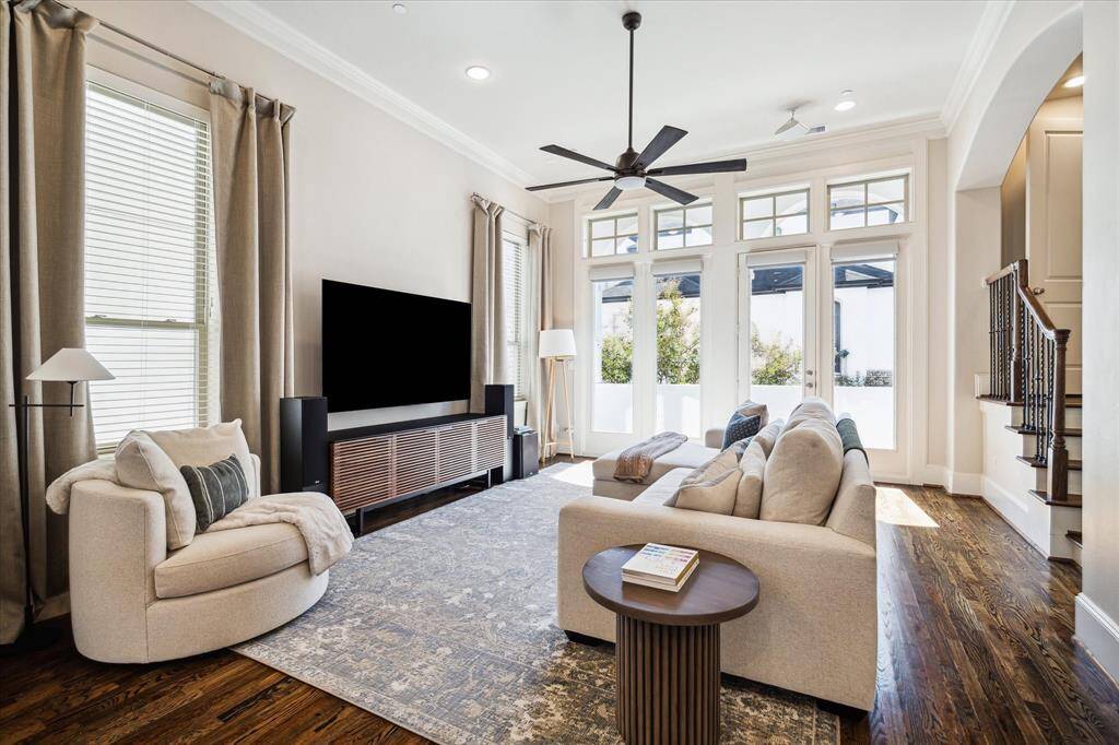 Discover your sun-kissed indoor-outdoor entertaining destination on the second floor, featuring tall ceilings with recessed lighting, ceiling-mounted speakers and elegant crown molding