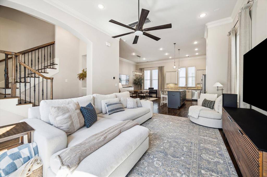 Enjoy a seamless flow from the living room and balcony to the inviting dining area and gourmet open kitchen.