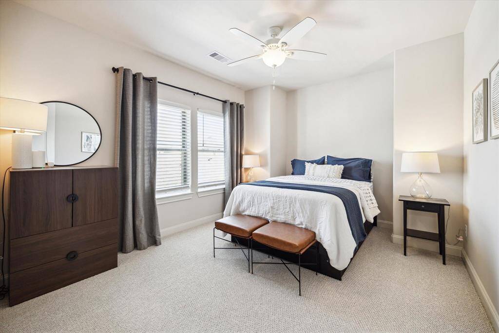 On the top-floor, you’ll find a carpeted secondary suite near the primary.