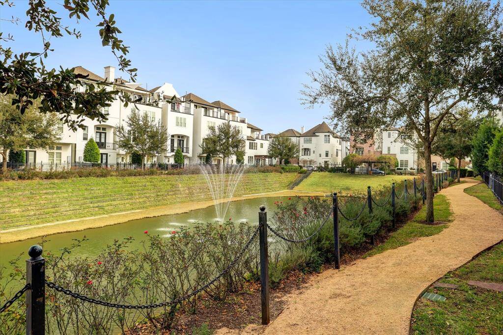 This beautiful gated community offers lovely mature landscaping and a centerpiece water feature.