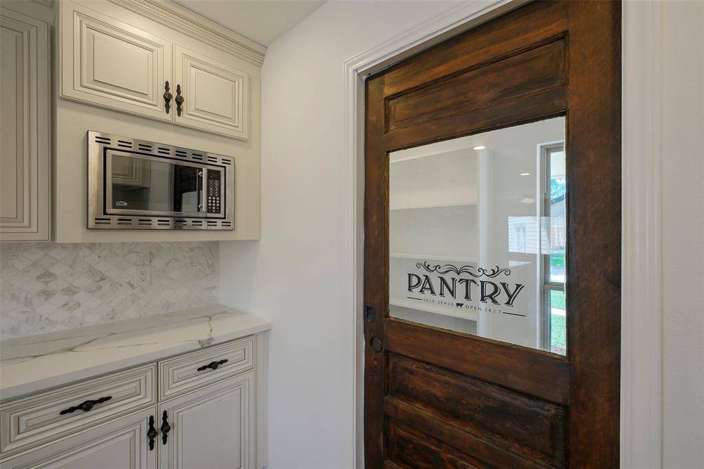 Walk in pantry with plenty of shelving space