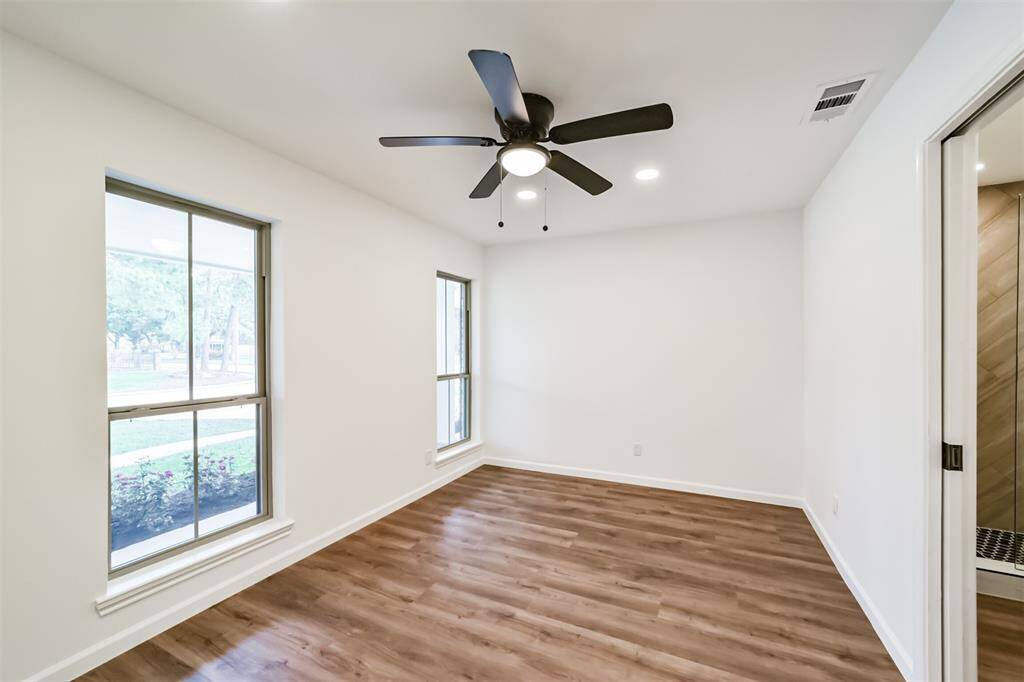 Bedroom number 1 is right off the front entry to the left and has an en-suite bath and closet. This room can also be used as an office space.