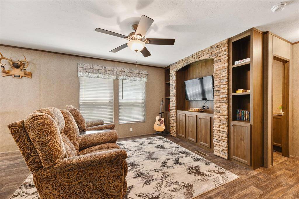 Built-in stacked stone entertainment center.