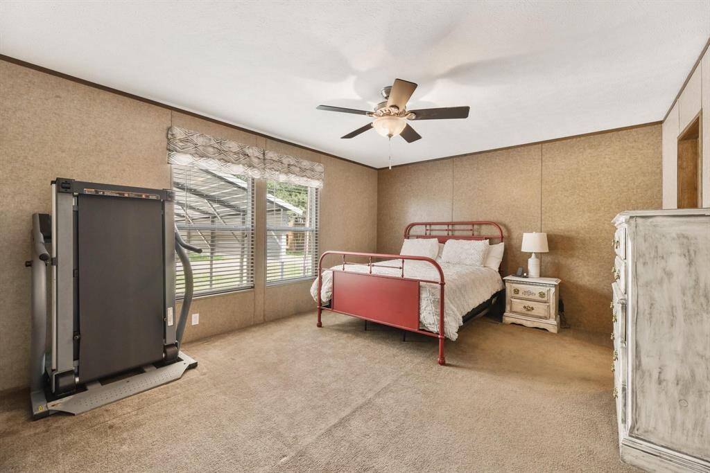 Primary Bedroom, that is sepfrom other bedrooms for privacy.