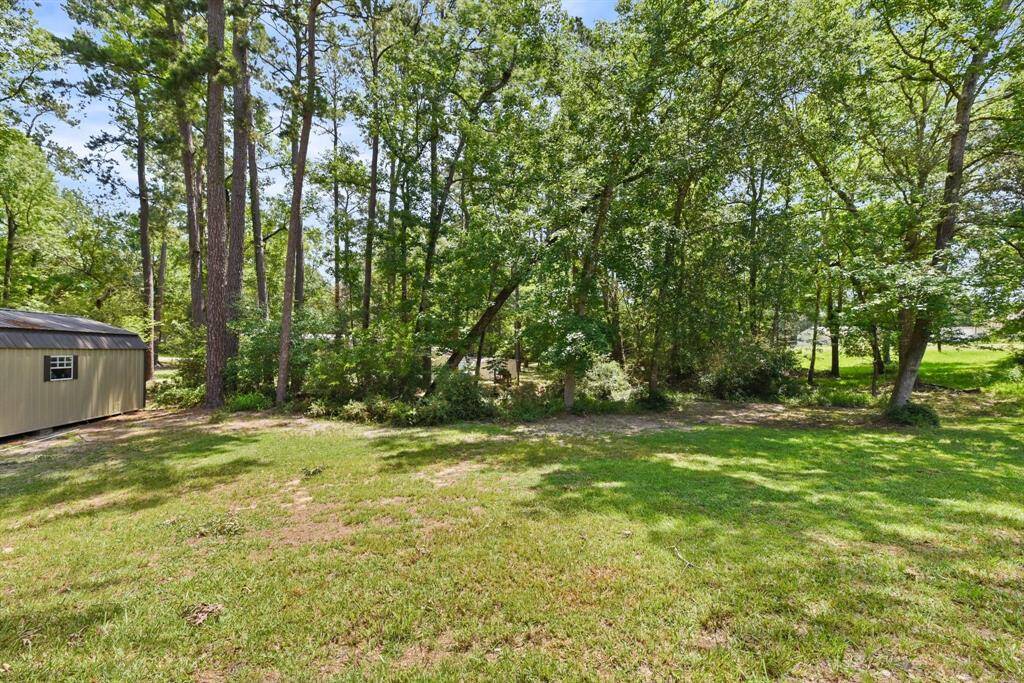 Large shed that will stay with the home for extra storage. You could fit a large golf cart in.