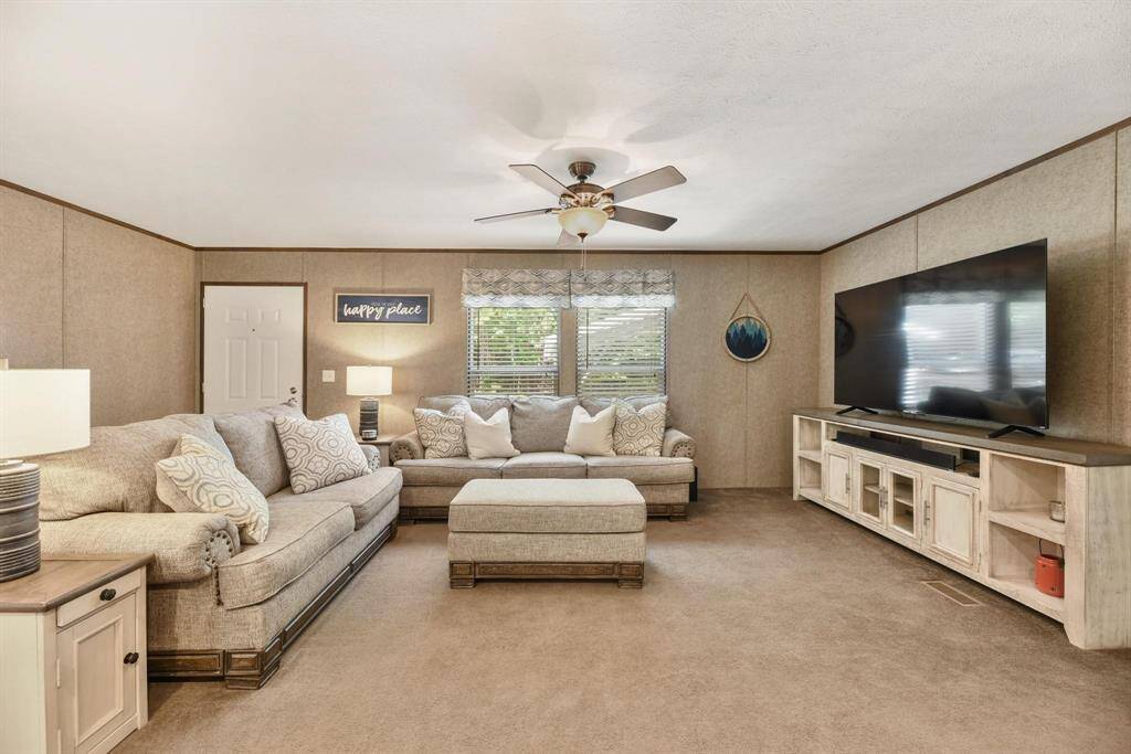 Living room open to Kitchen.