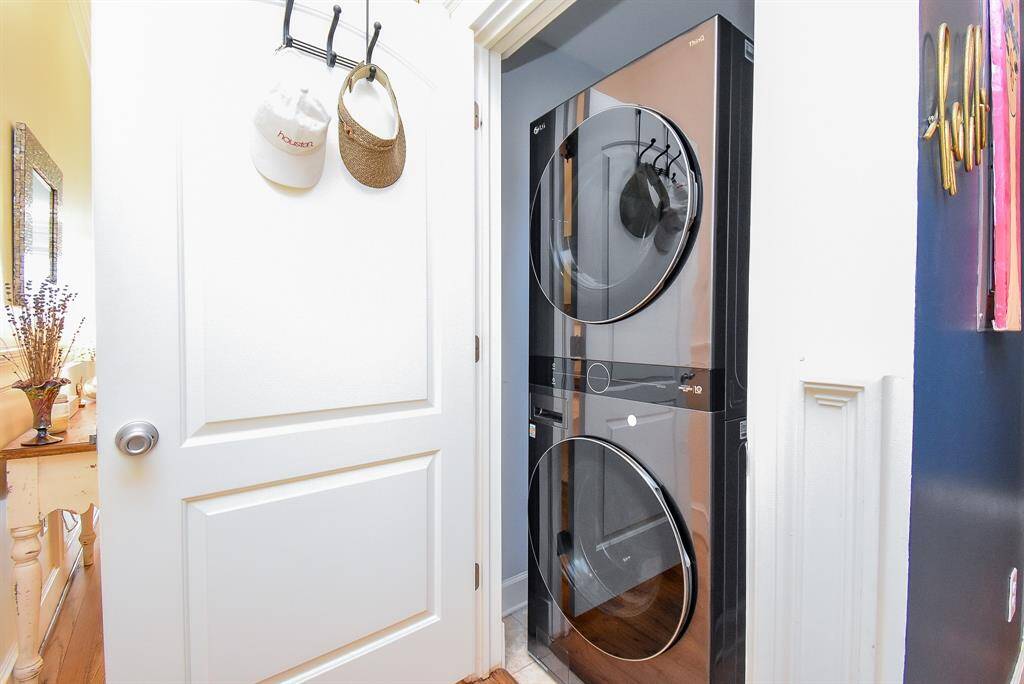New LG stacked washer and dryer located inside your mid-rise
