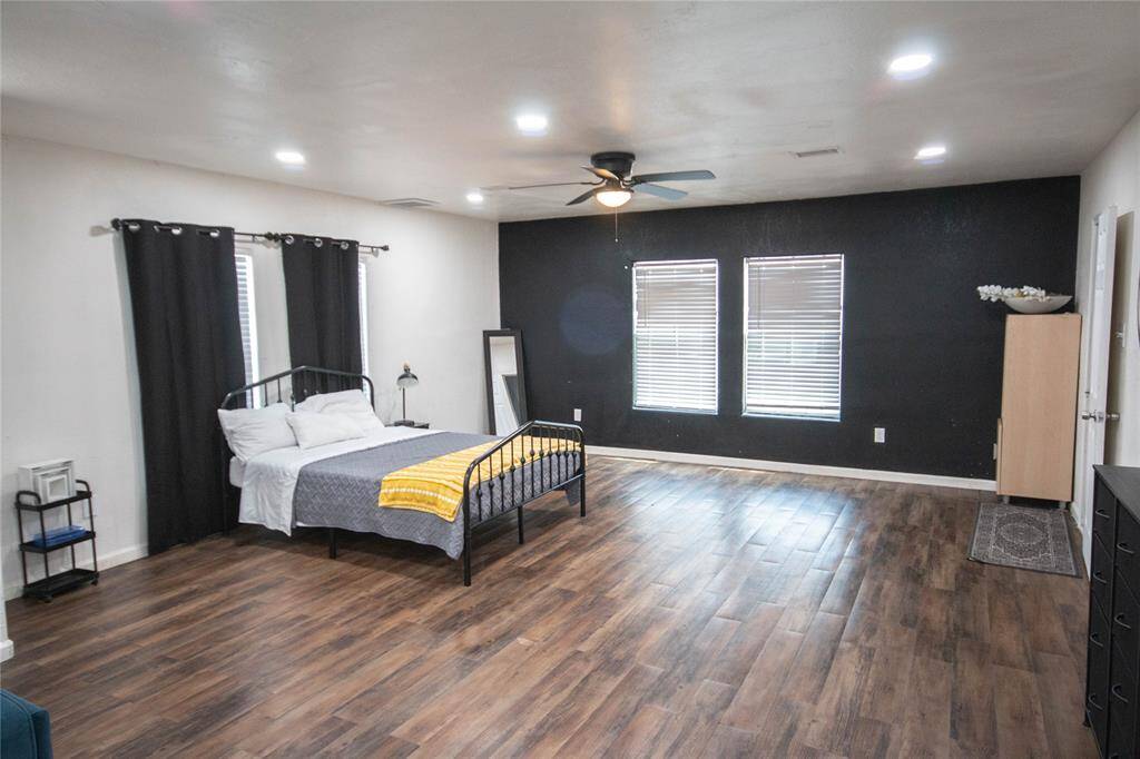 Bedroom area in the studio unit and through the door to the right is a bathroom