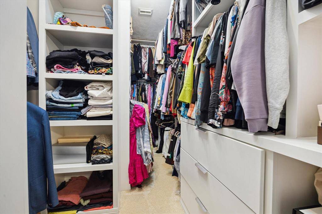 Bright and spacious with sleek finishes, backlit mirrors, and ample storage—designed with both style and function in mind.