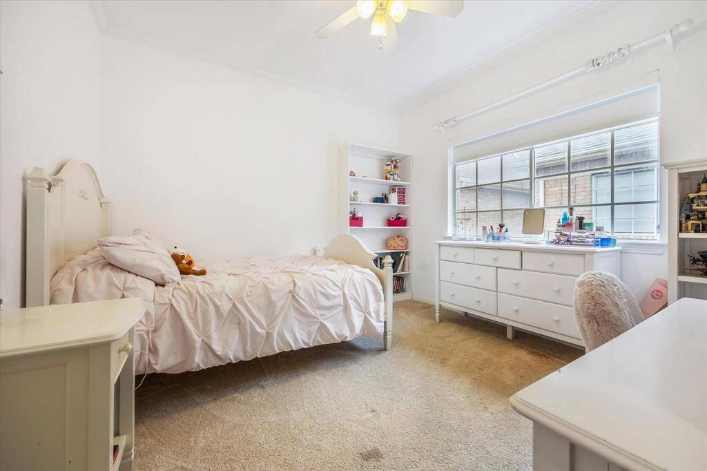 Full bathroom with a large vanity, updated lighting, and a tub/shower combo—conveniently located to serve both upstairs bedrooms.