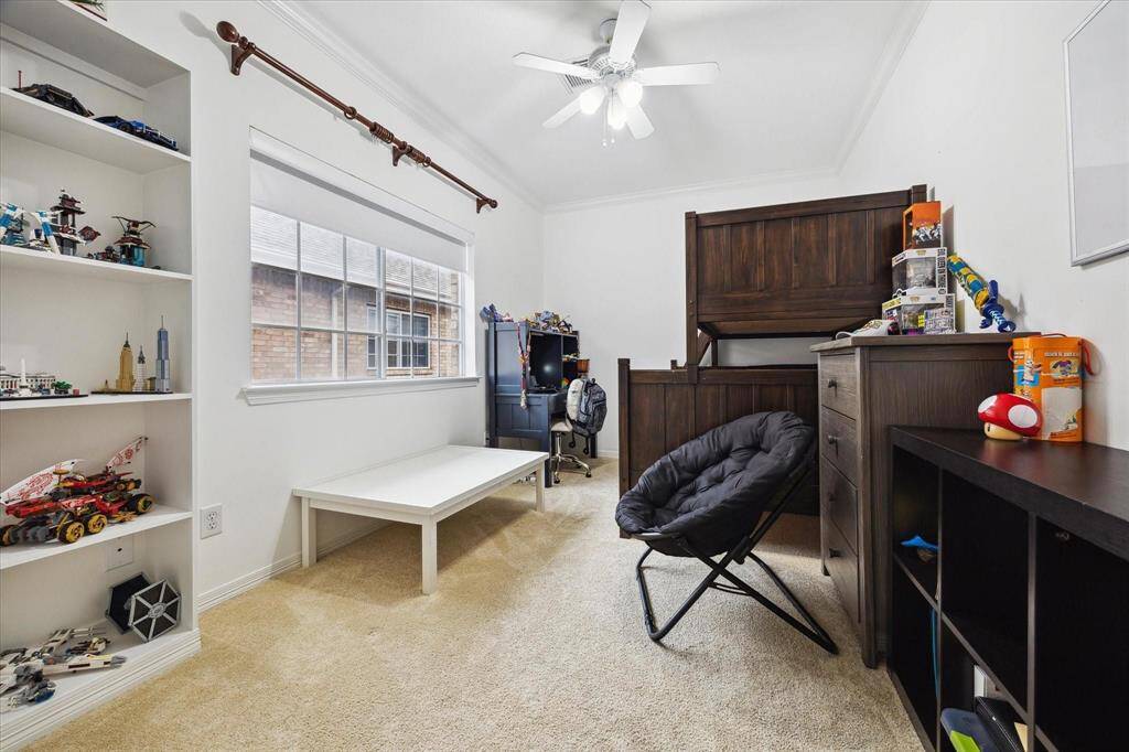 Expansive third-floor bonus room—ideal as a media room, game room, home gym, or private guest retreat with plenty of space to relax.