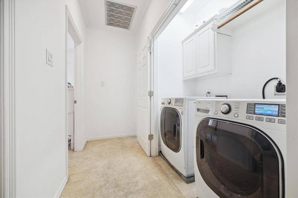 Full bathroom conveniently located on the third floor, featuring a large vanity, ample storage, and a tub/shower combo for added functionality.