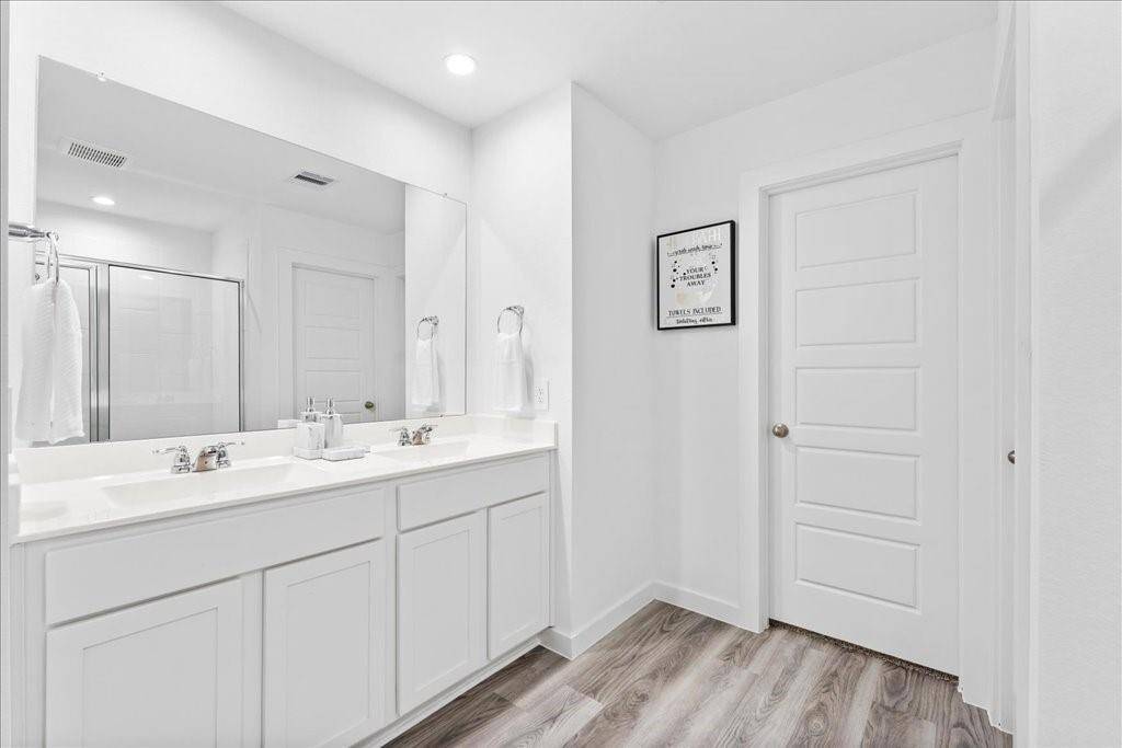 Primary Bathroom with dual vanity.