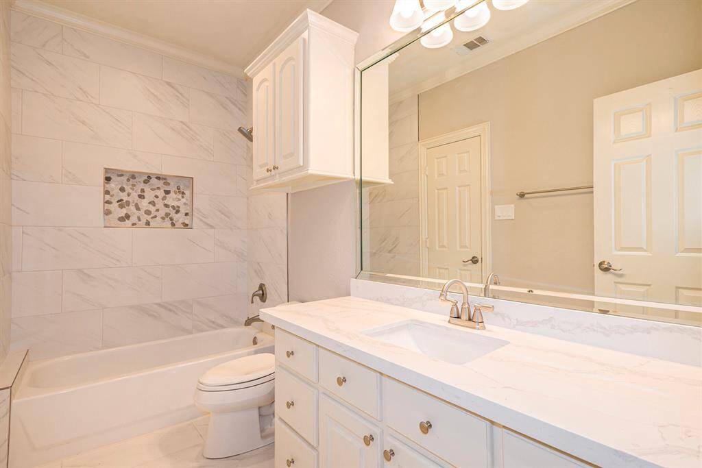 Full bath with access to the hallway & additional upstair bedroom