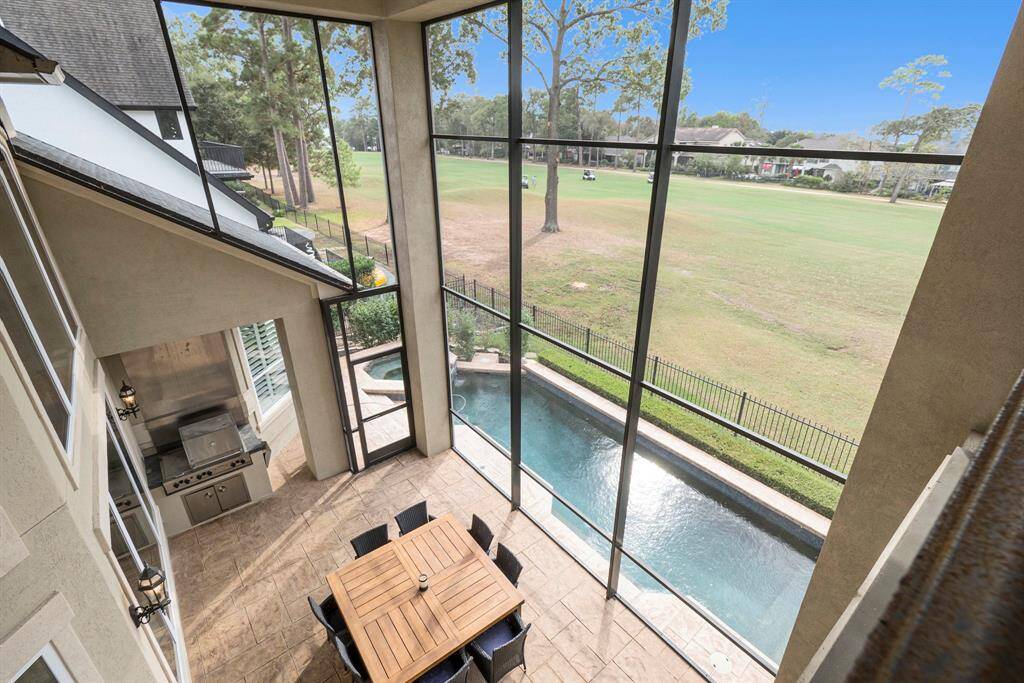 View from the game room balcony inside the fully screened in patio