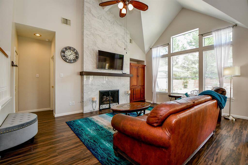 What a magnificent view from your one-of-a-kind living area; taking in 1st floor common areas, and a beautiful look at the grand staircase, too!