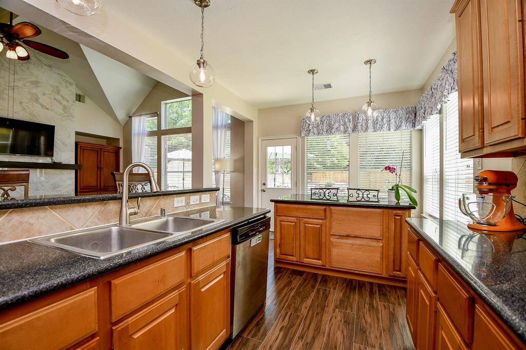 Entertain and reign in your kitchen, while socializing with guests in the living area, beyond!