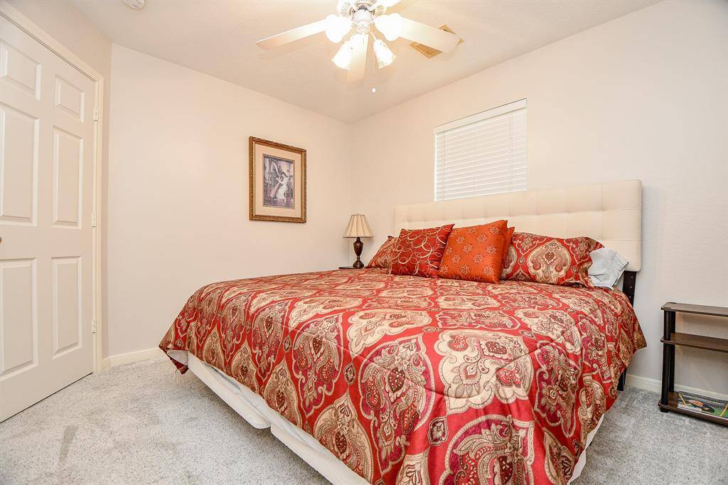 Comfy, sizeable pieces are at home in a secondary bedroom.