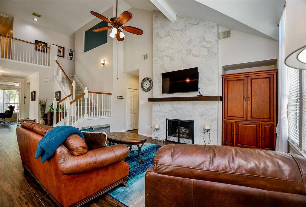This amazing space offers plenty of room for sizeable pieces and the divine built-in floor-to-ceiling shelving unit.