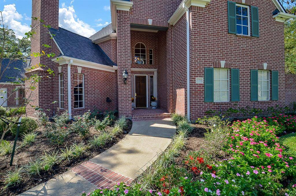 You are greeted with lush landscaping as you enter this one of a kind home!