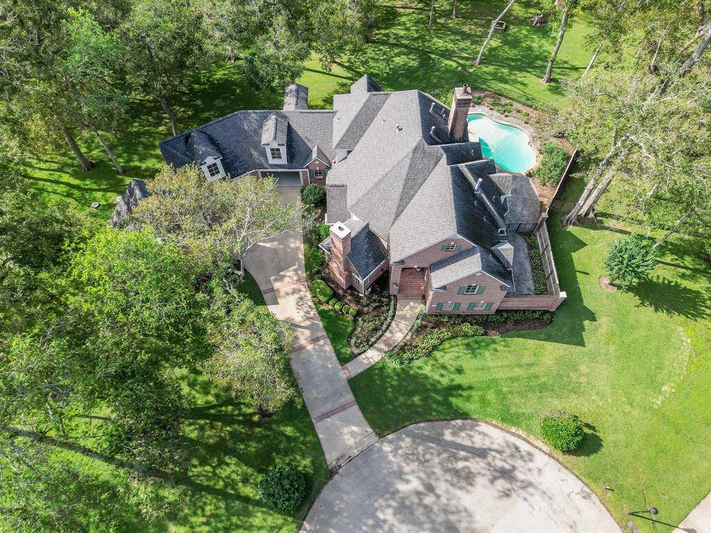 Exquisite property surrounded by mature trees!