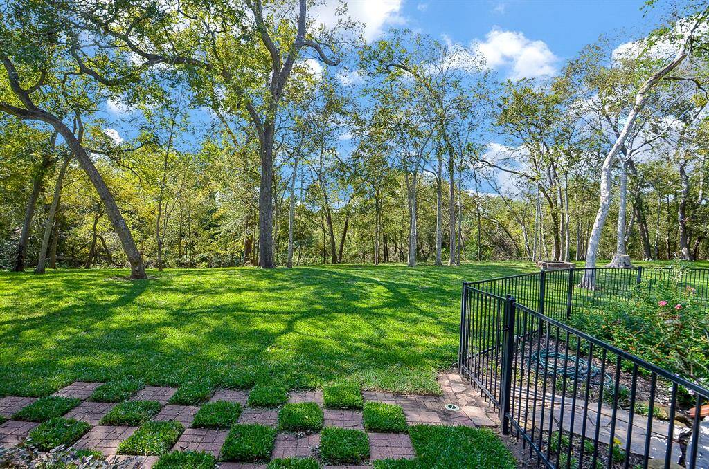 Love this manicured landscape design out back!