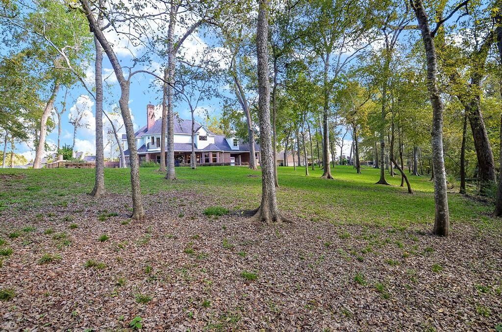 This acreage lot is pie shaped which offers an abundance of privacy!