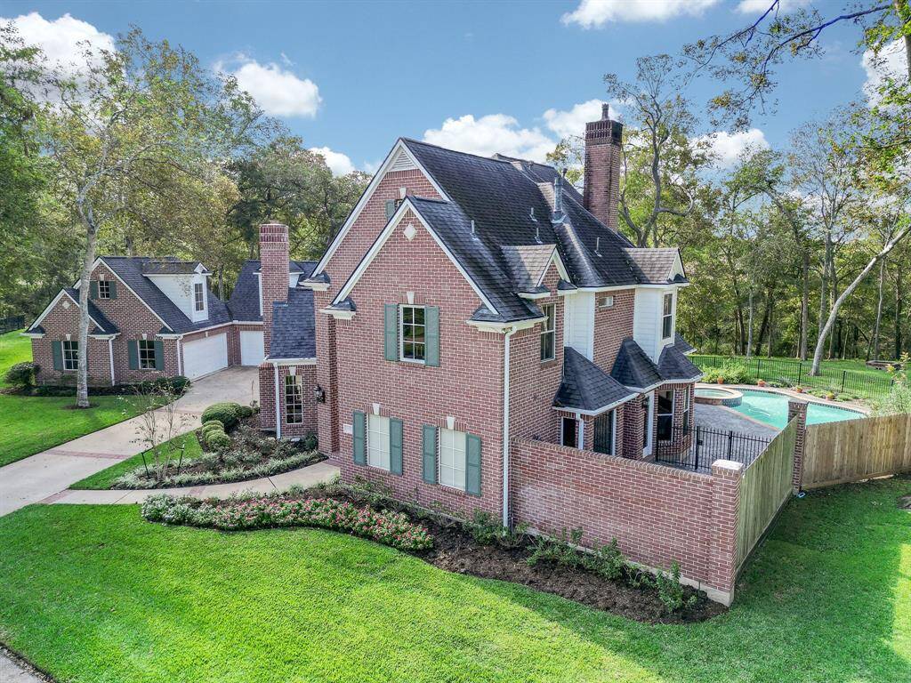 This beautiful estate is located on 1+/-acre on a cul-de-sac lot in a Gated Community!