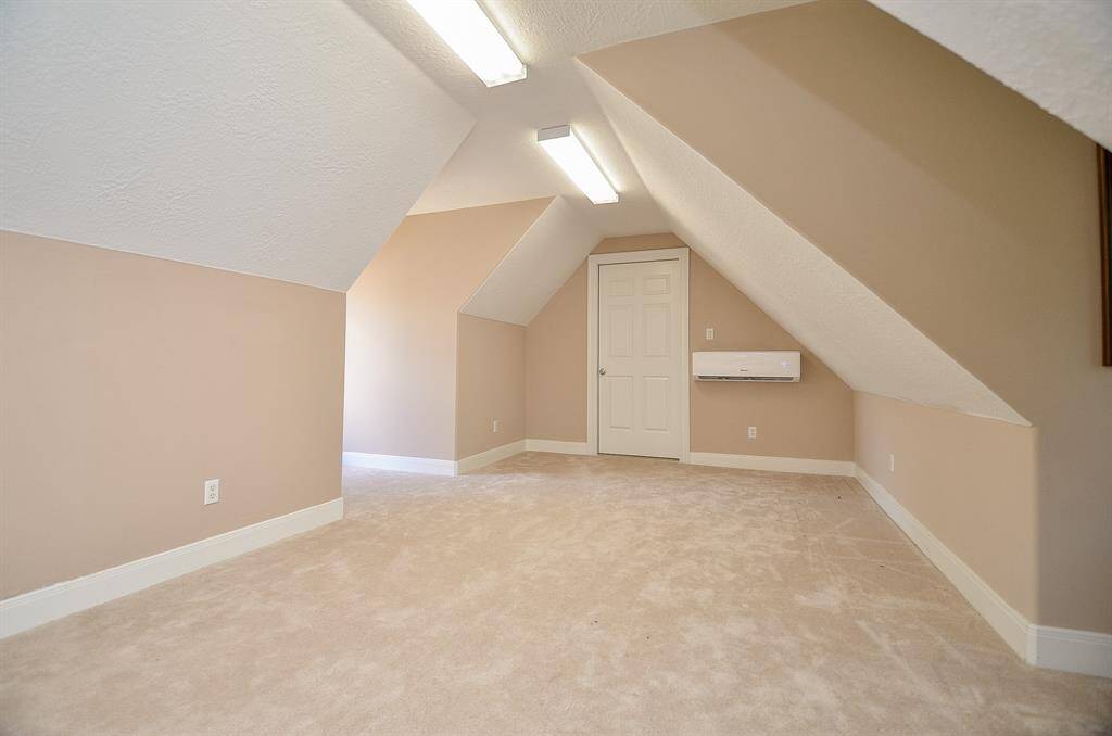 Bonus Room upstairs off of the Gameroom .    This room has a mini split!