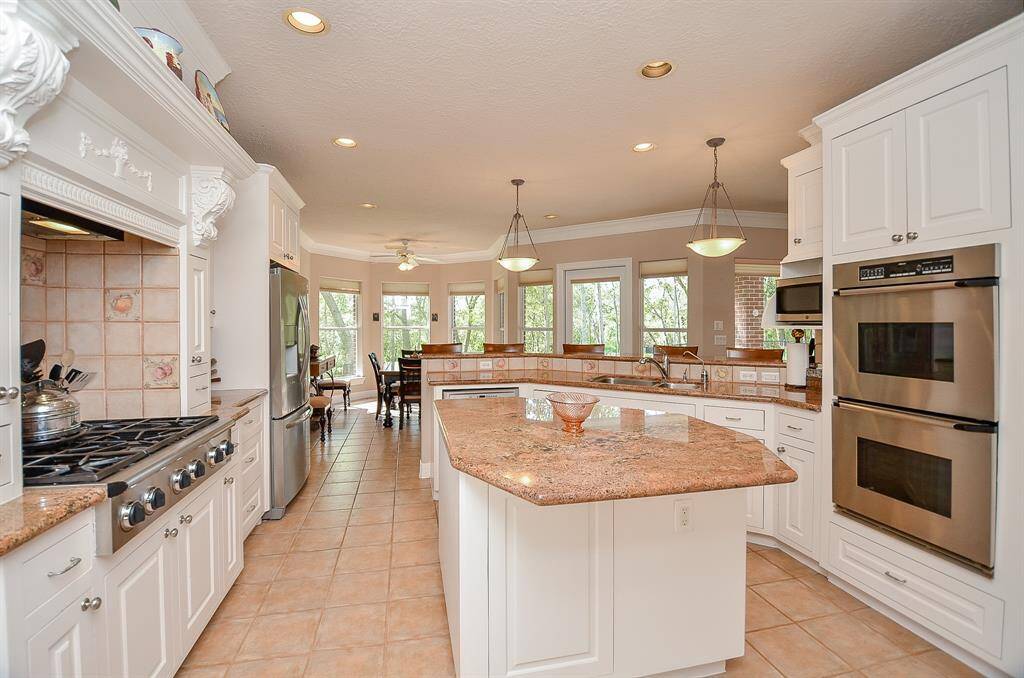 A large Island Kitchen with double ovens, a wine refrigerator and more!