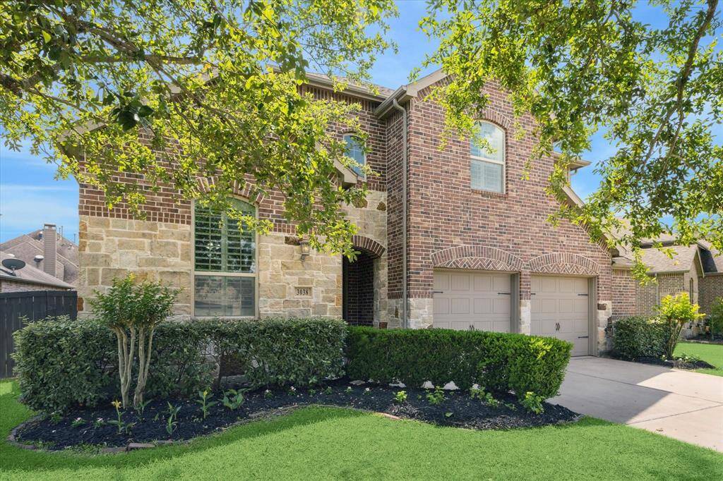 Front exterior elevation, arched brickwork with architectural detail. Sedona Lakes has annual maintenance fee of $992. Homeowners enjoy the recreational facilities, clubhouse, pool,trails, and playgrounds. Crest Management handles the Sedona Lakes Homeowners Association, and they are very responsive.