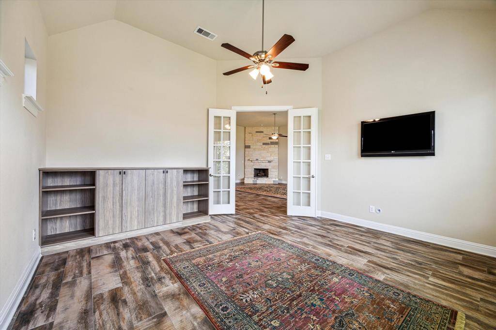Stylish custom cabinetry with plenty of shelving and storage for your electronics.